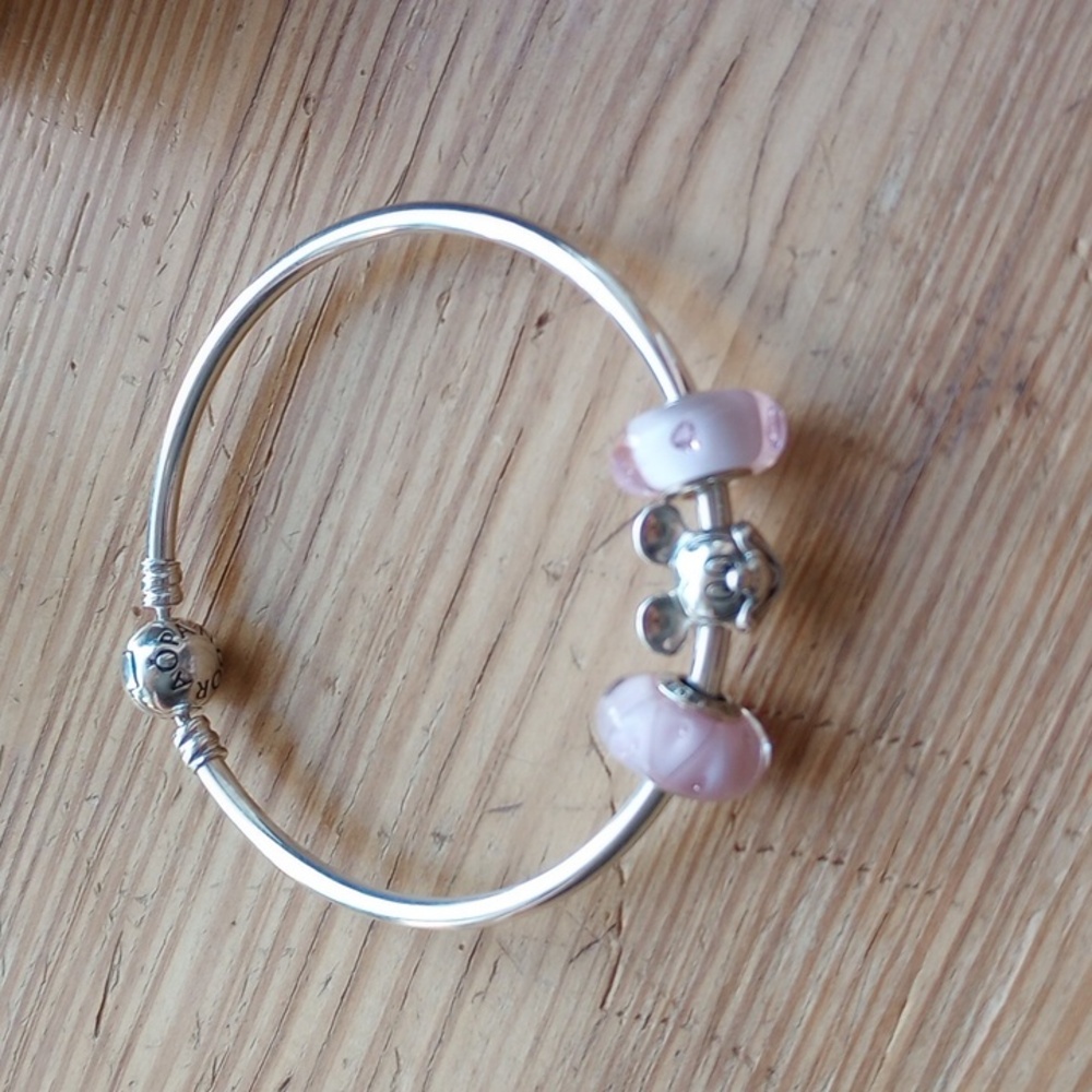 Pandora bangle bracelet with mickie mouse charm and 2 additional pink charms